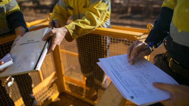 Engineers making notes - CHAS method statement