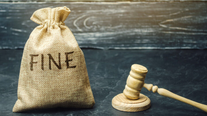 image of a gavel and a woven bag with fine written on it