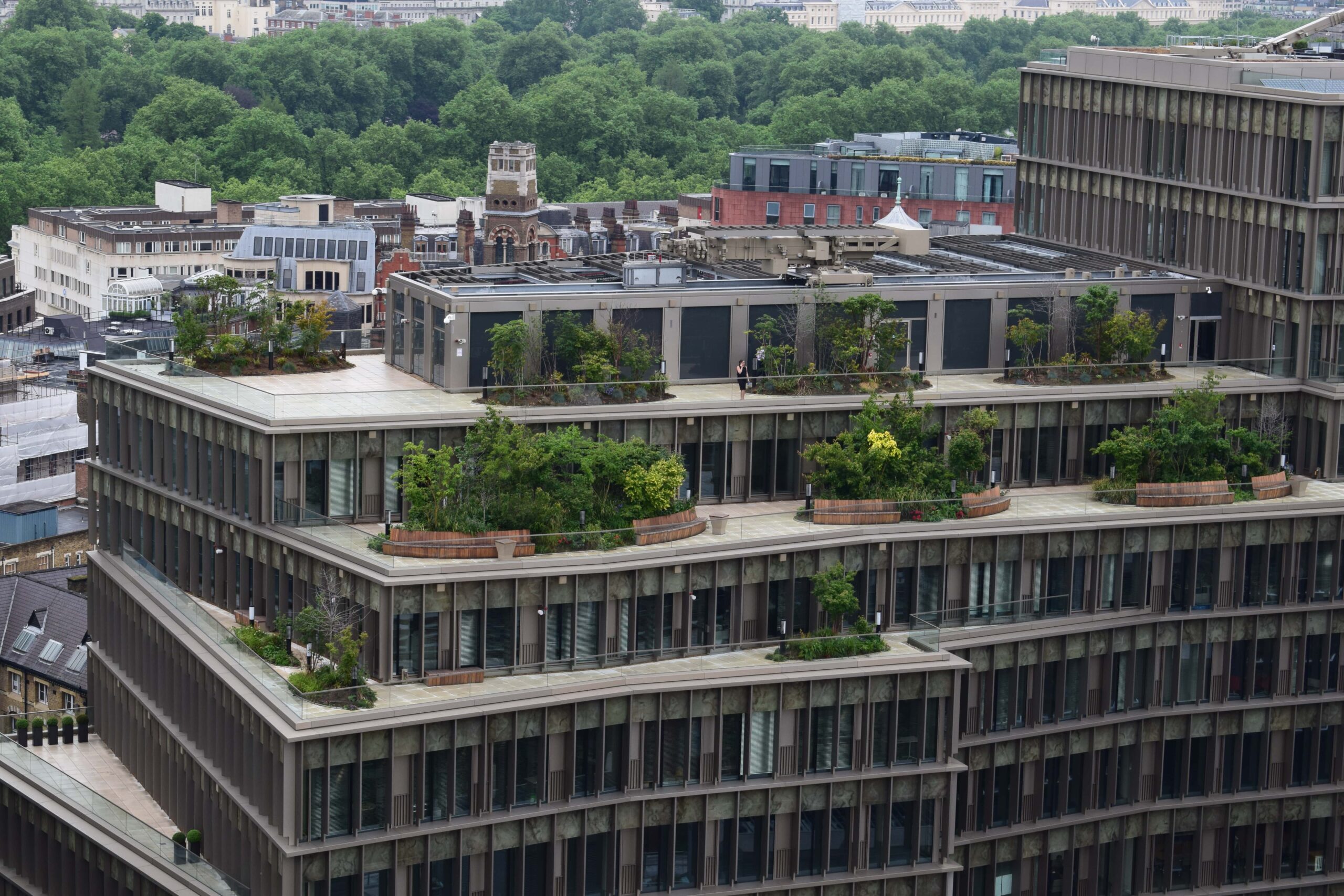 apartment block with penthouse flare and rooftop gardens