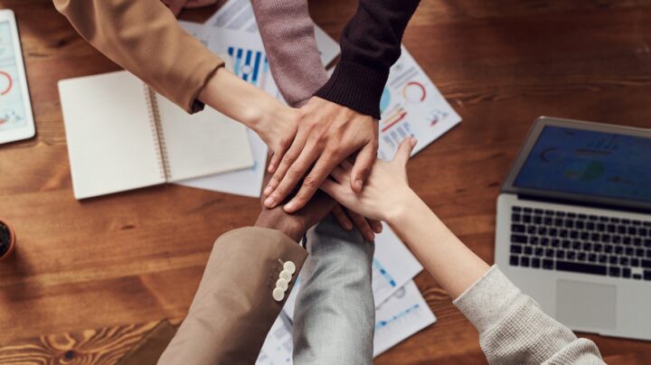 teamwork hands in - brand trustworthiness