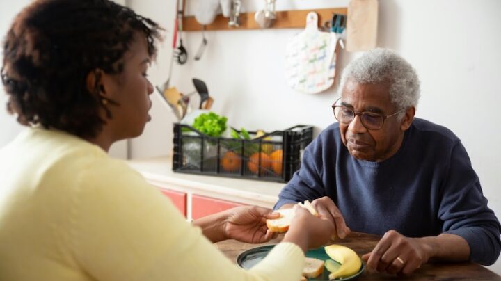 social care worker with elderly man
