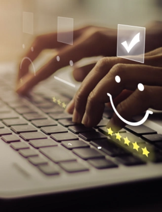 businesswoman pressing smiley on -keyboard laptop