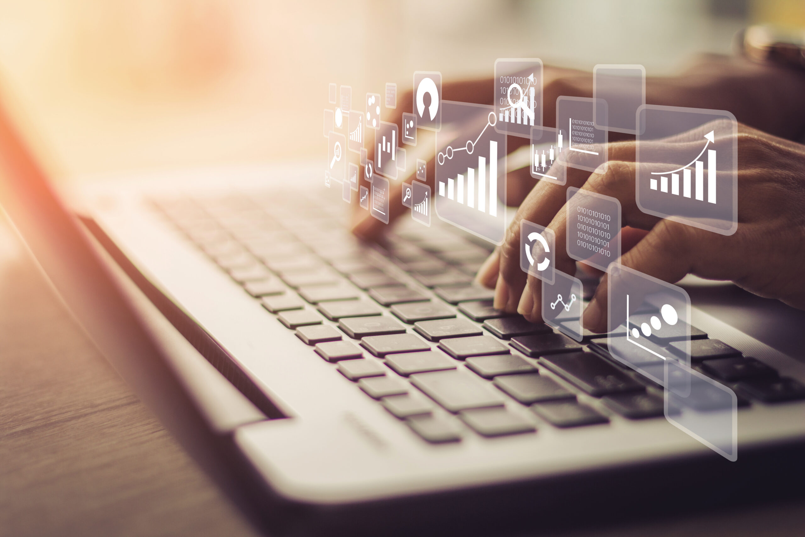 Businesswoman using laptop in data management.
