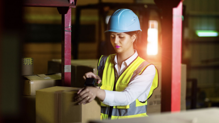 construction worker checking supply chain security