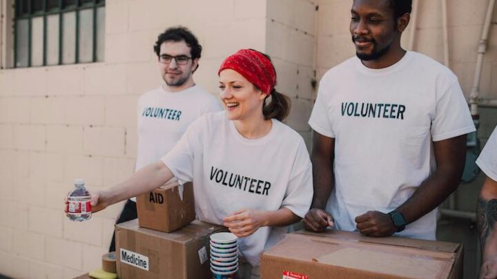 volunteers giving out drinks