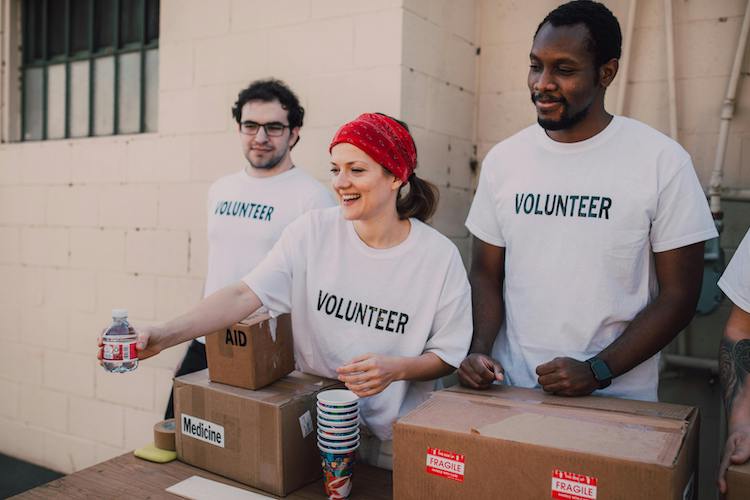 volunteers giving out drinks