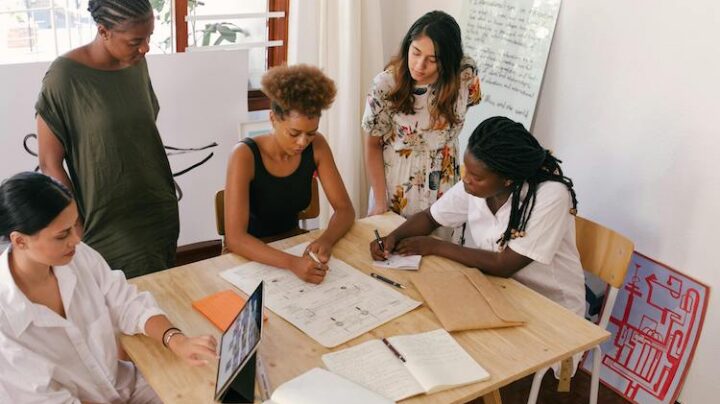 women at meeting collaborating