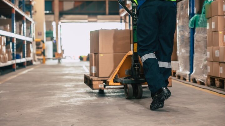 warehouse staff moving boxes