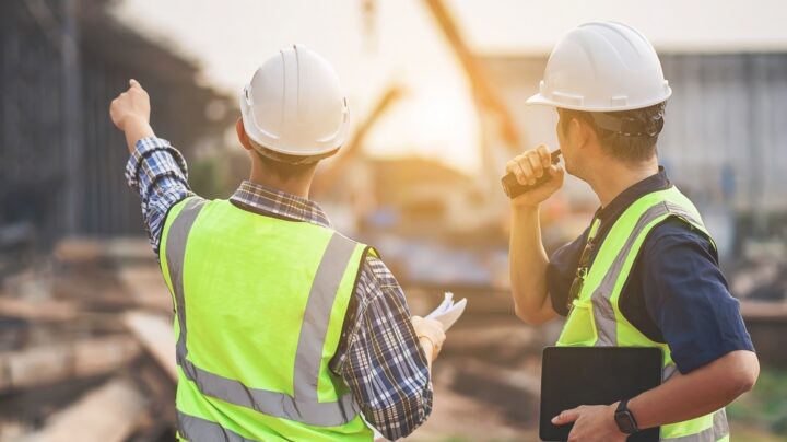 civil engineer architects wearing safety gear